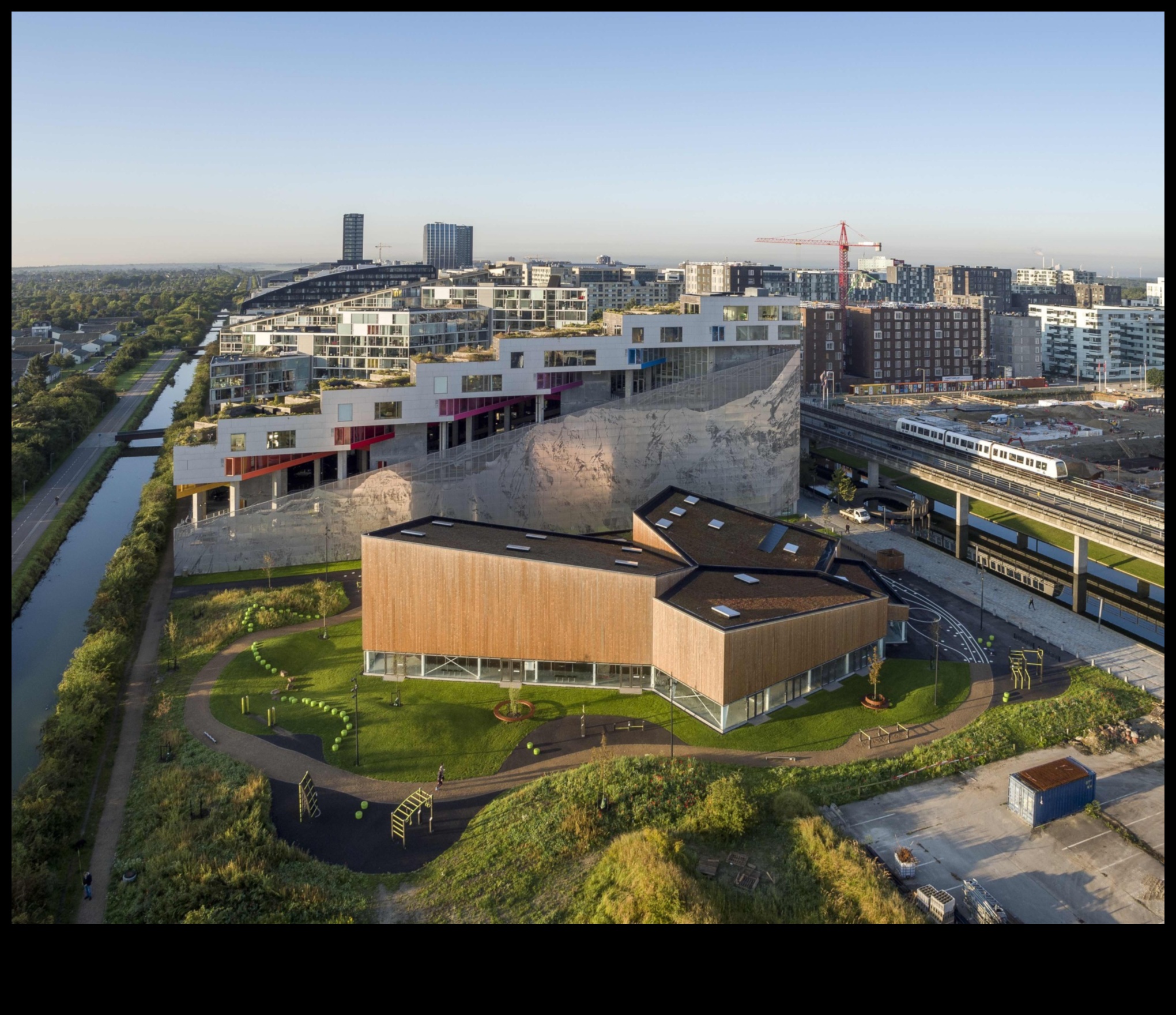 How do landscapes influence the design of outdoor sports facilities?