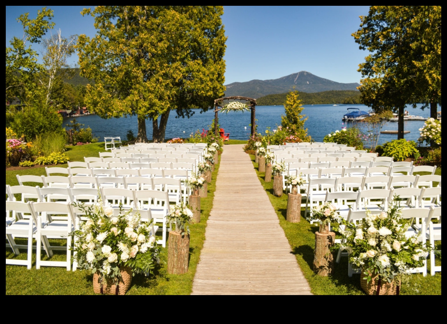 How do landscapes influence the design of outdoor wedding venues?