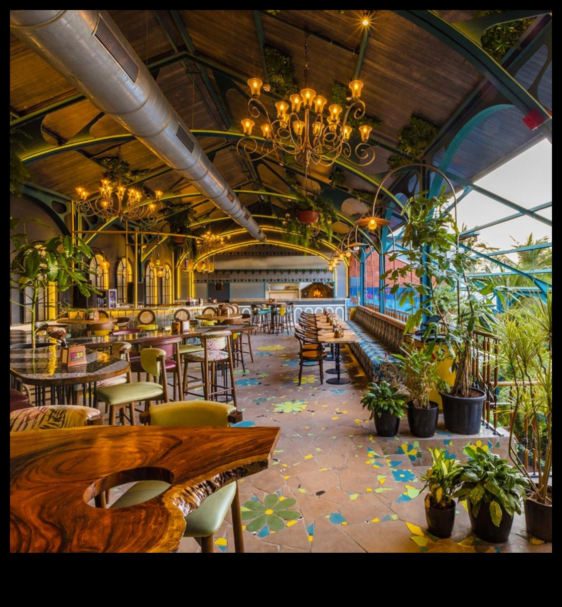 How do landscapes contribute to the visual appeal of urban rooftop restaurants?